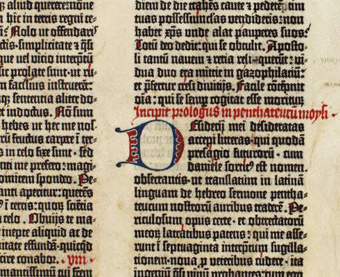 A page from Gutenberg's 42-Line Bible. The red and drop cops were added by hand, but all black text was done with the first true movable type.